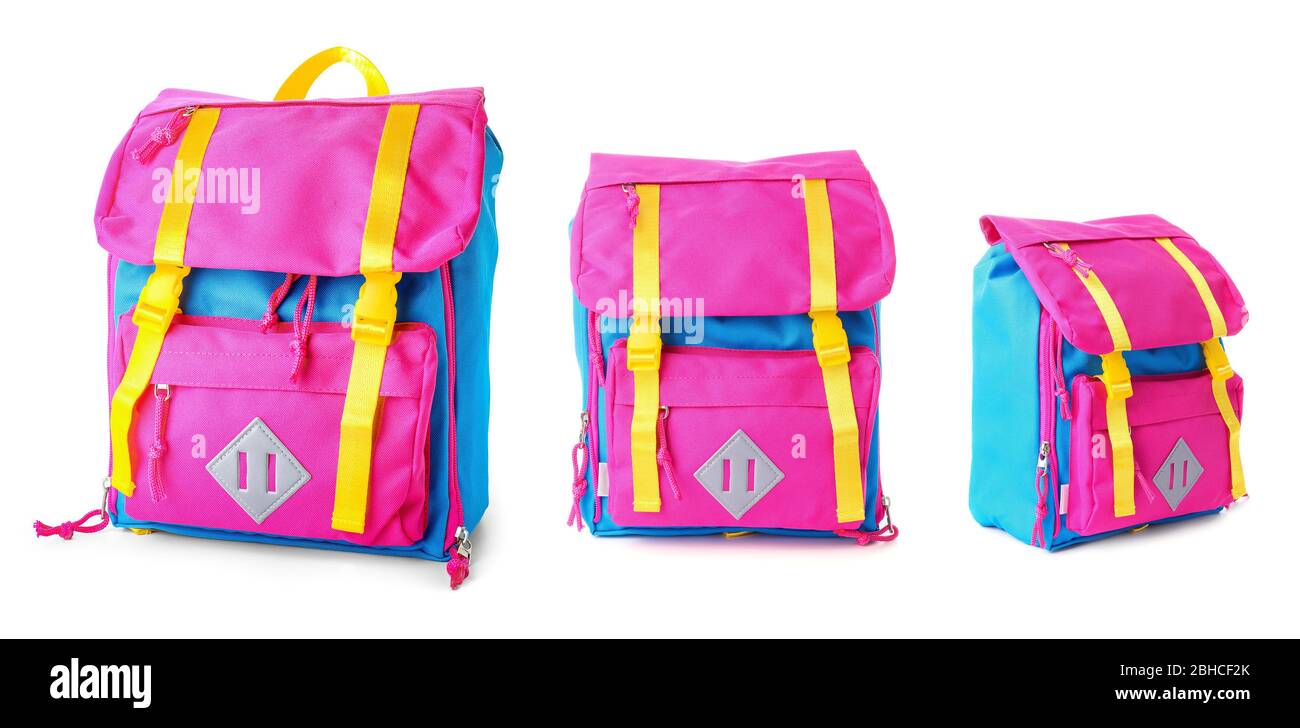 School backpacks of different sizes on white background Stock Photo Alamy
