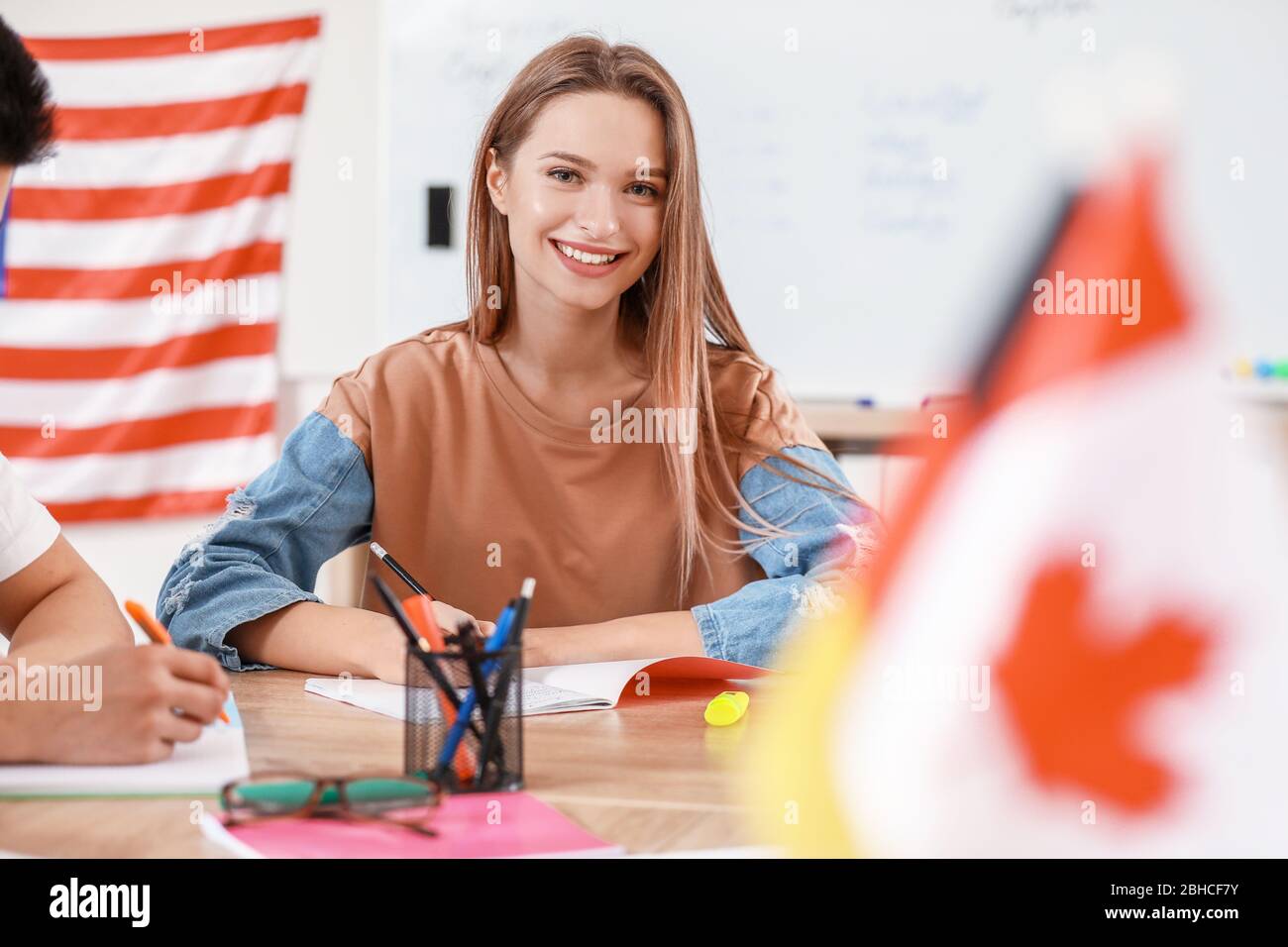 Woman taking classes at language school Stock Photo
