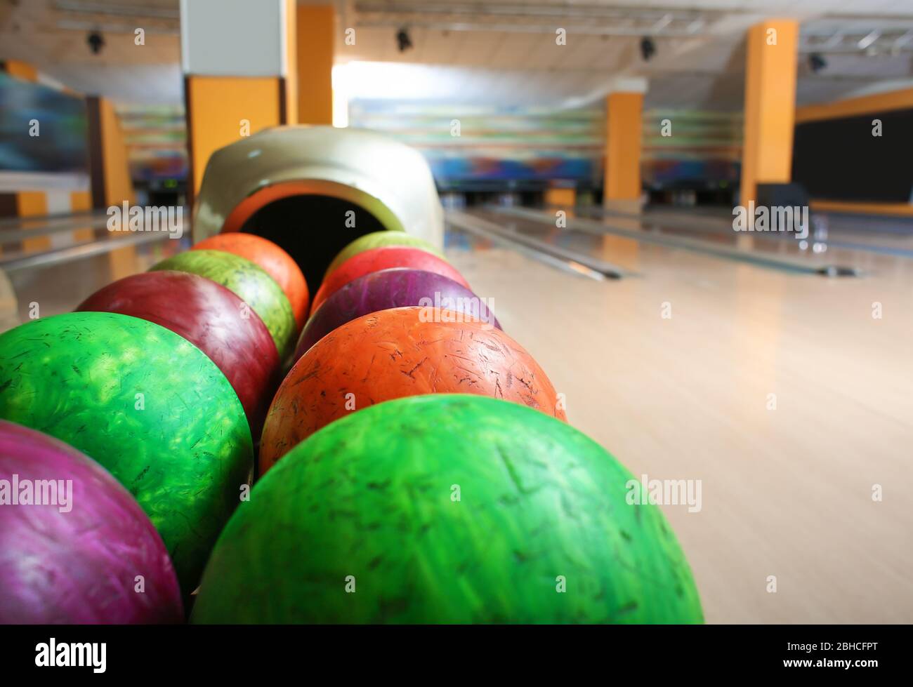 Stand with balls in bowling club Stock Photo Alamy