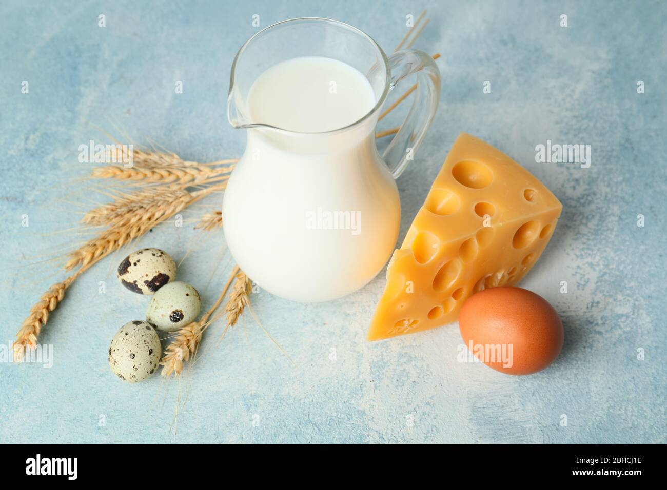Different dairy products on color background Stock Photo