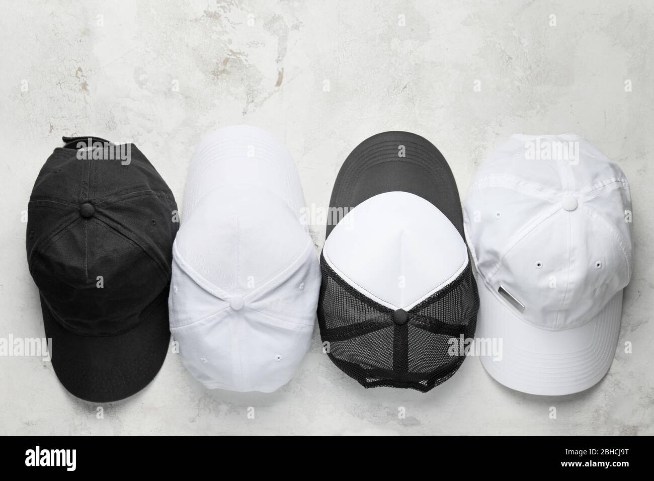 Blank caps on light background Stock Photo Alamy