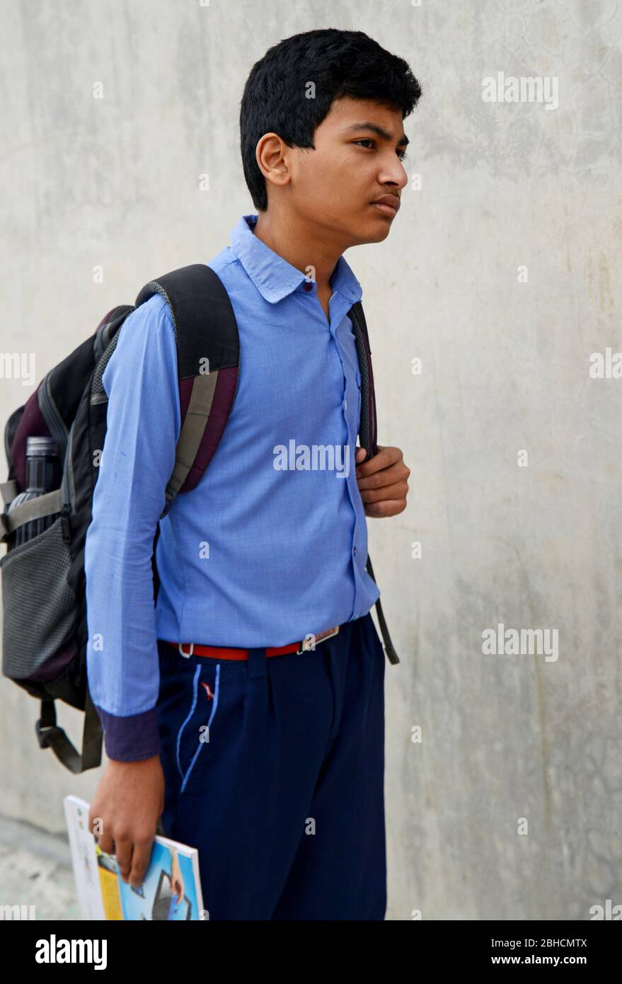 School boy wearing uniform and bag Stock Photo - Alamy