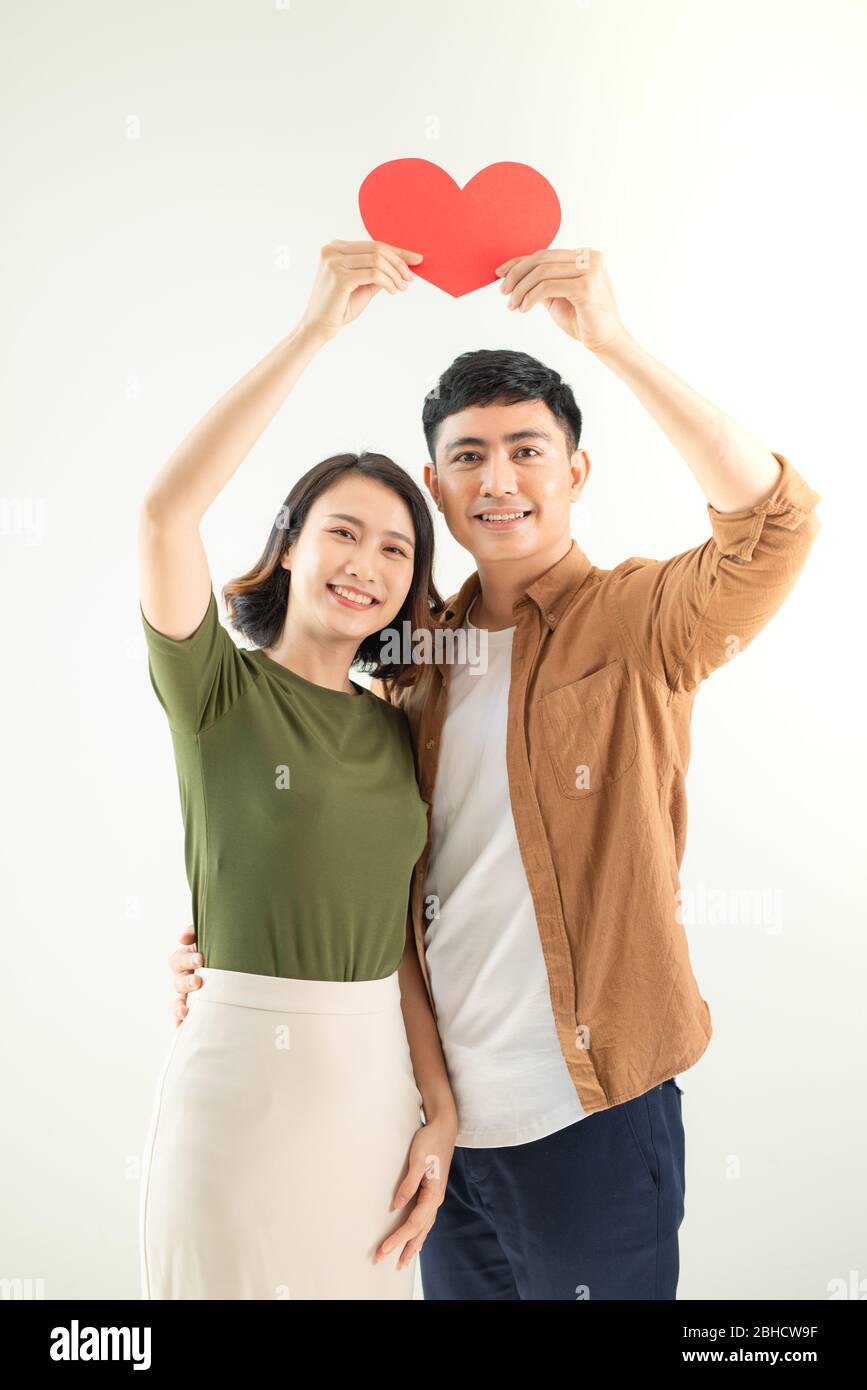 Couple holding heart hi-res stock photography and images - Alamy