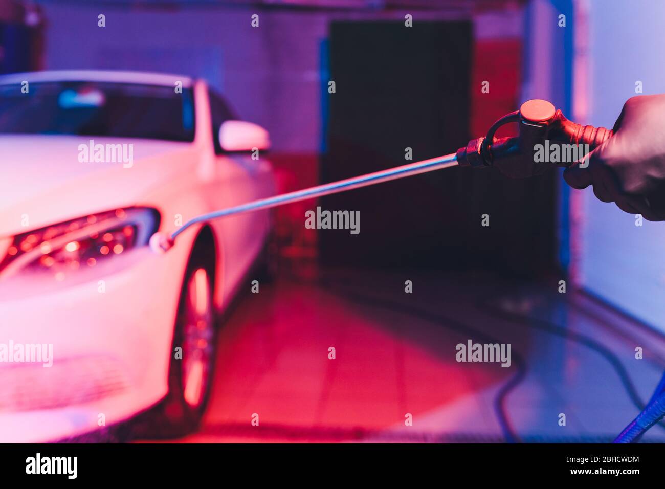 Close up cleaning car using high pressure water,High pressure jet