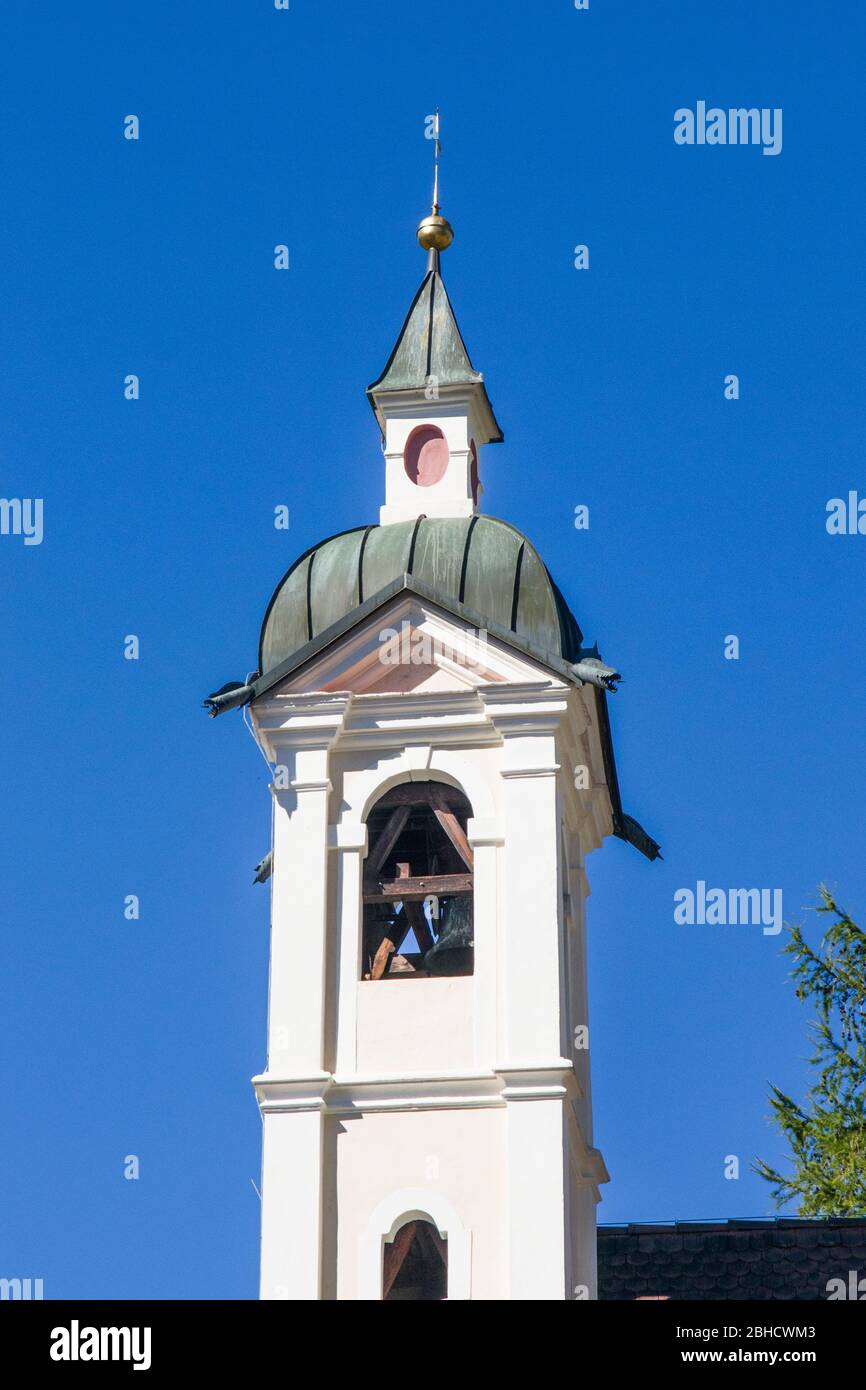 church with onion bell tower in the mountains in the Gothic style with ...