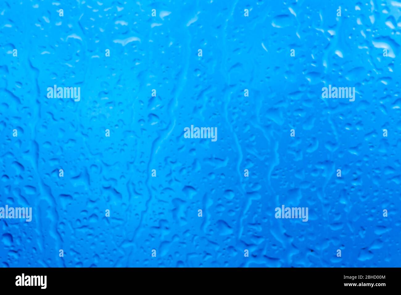 Close up glass of blue raining drop, water drop on the window Stock ...