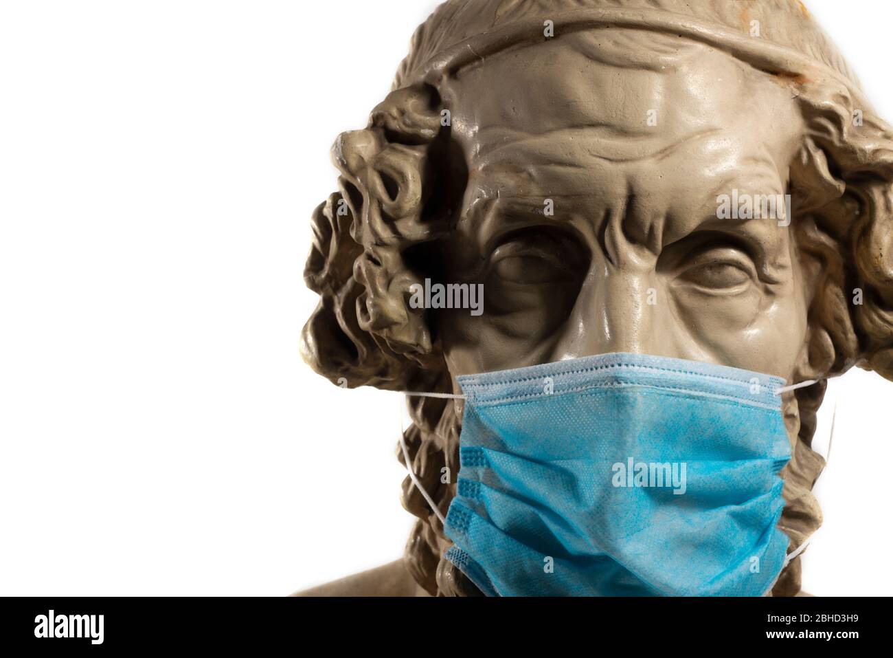 Gypsum Copy of Ancient Statue Homer Wearing Virus Face Mask Stock Photo
