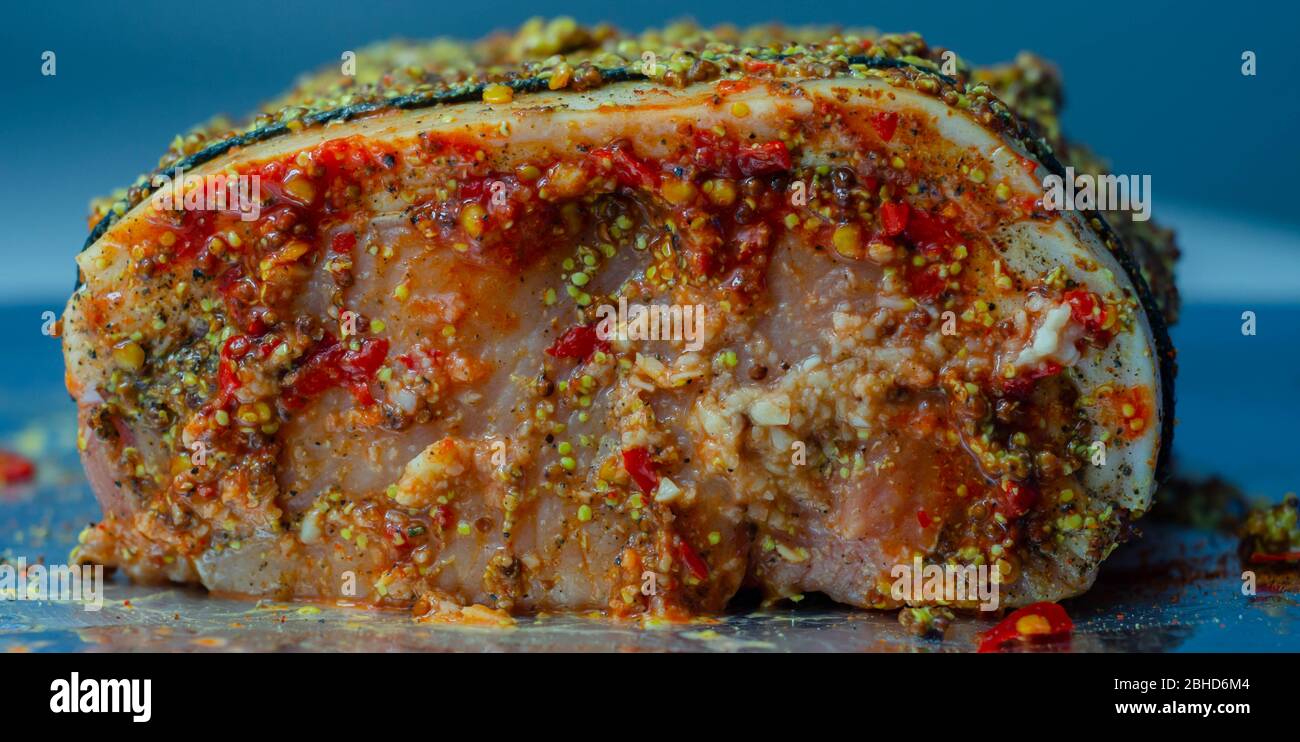 Boneless British rindon pork loin joint, prepared in marinades