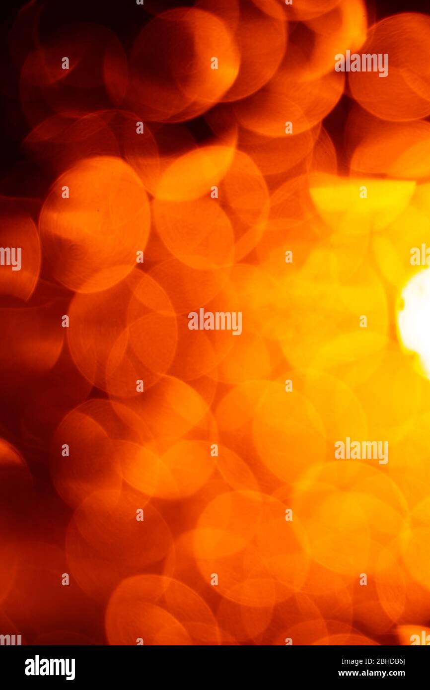 Nice abstract orange bokeh background with different lights Stock Photo