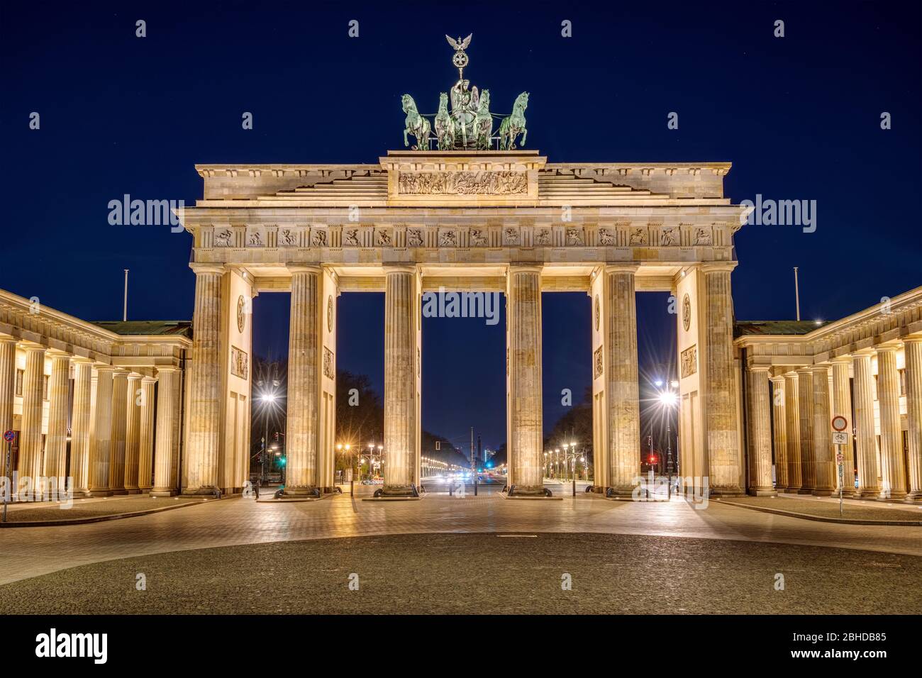 The famous illuminated Brandenburg Gate in Berlin at night Stock Photo