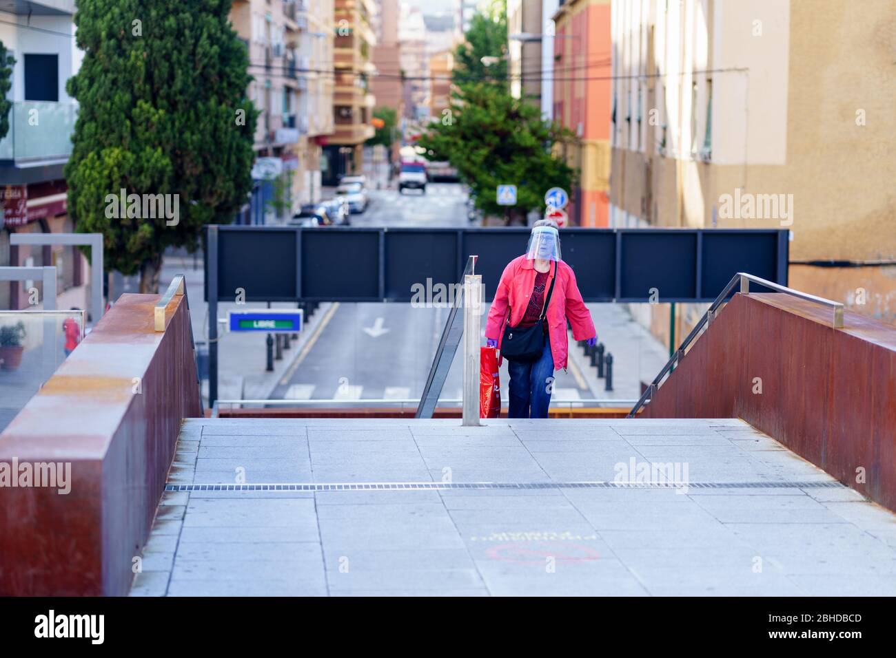 Older woman wearing a face mask hi-res stock photography and images - Alamy