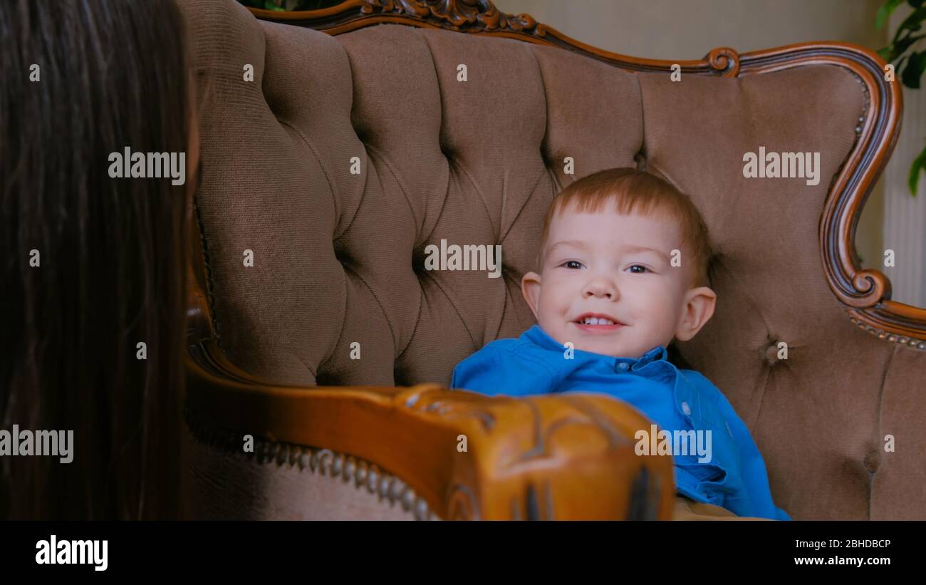 Portrait of funny little boy at home. Family, childhood and leisure concept Stock Photo