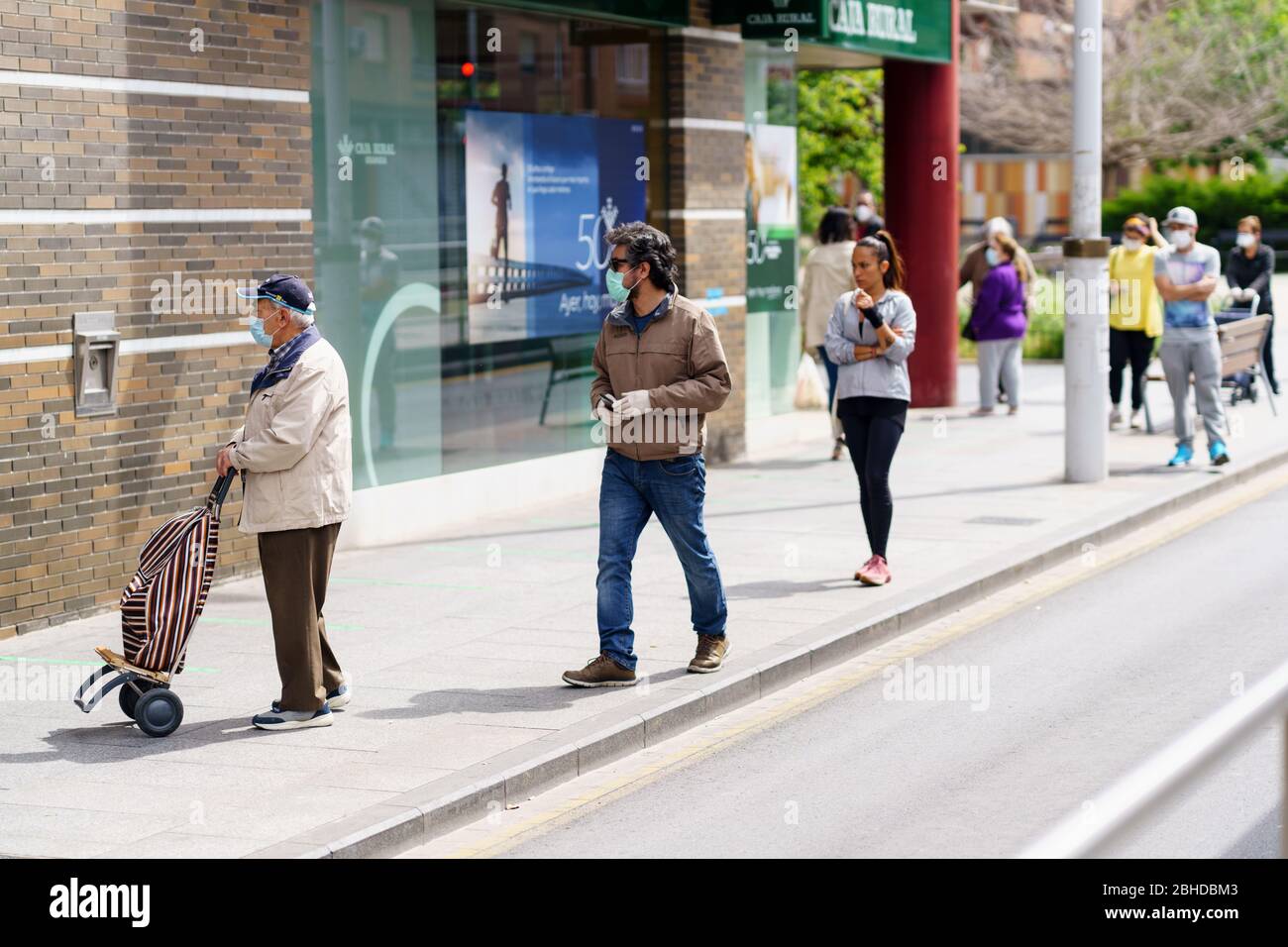 Customers line up outside the Pickle Guys store in the Lower East Side of  New York on Sunday, April 2, 2017 to buy freshly ground horseradish and  pickles for Passover. Everyone from