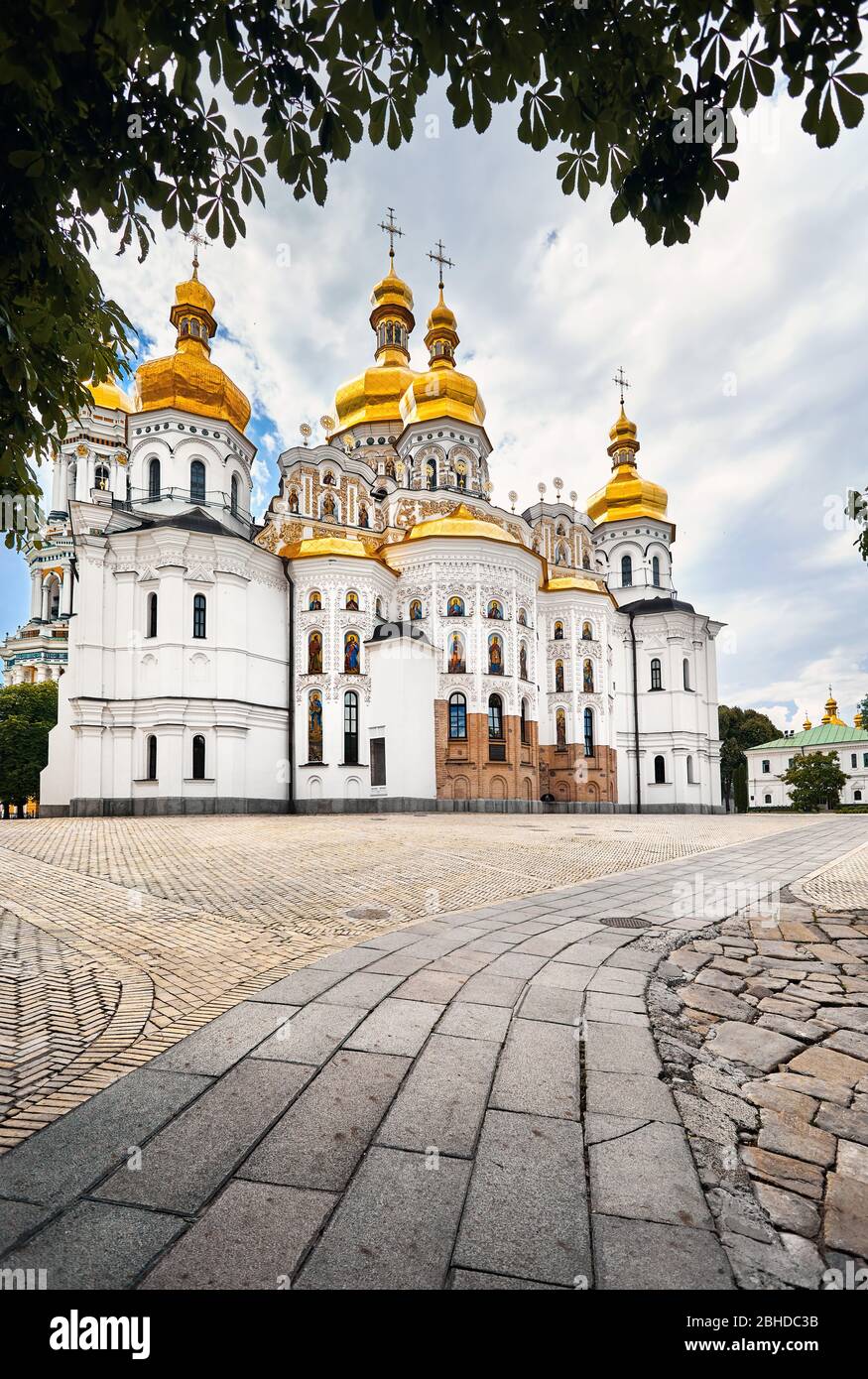 Church with golden domes at Kiev Pechersk Lavra Christian complex. Old historical architecture in Kiev, Ukraine Stock Photo