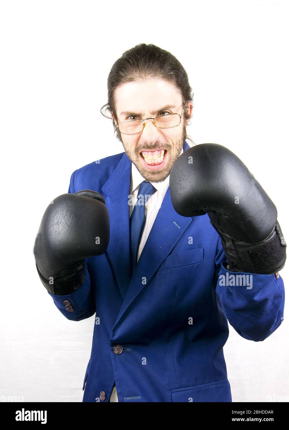 a men with lboxing gloves in buisness Stock Photo
