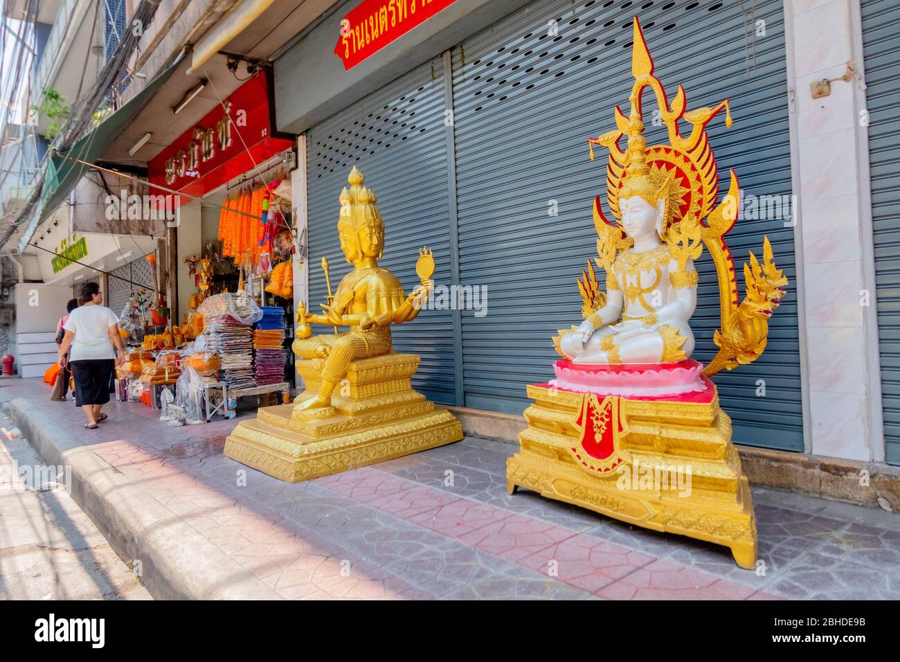 Image of buddha were placed on the pavement in downtown area of Bangkok waiting for sell to customer. Bangok, Thaialnd April 14, 2018 Stock Photo