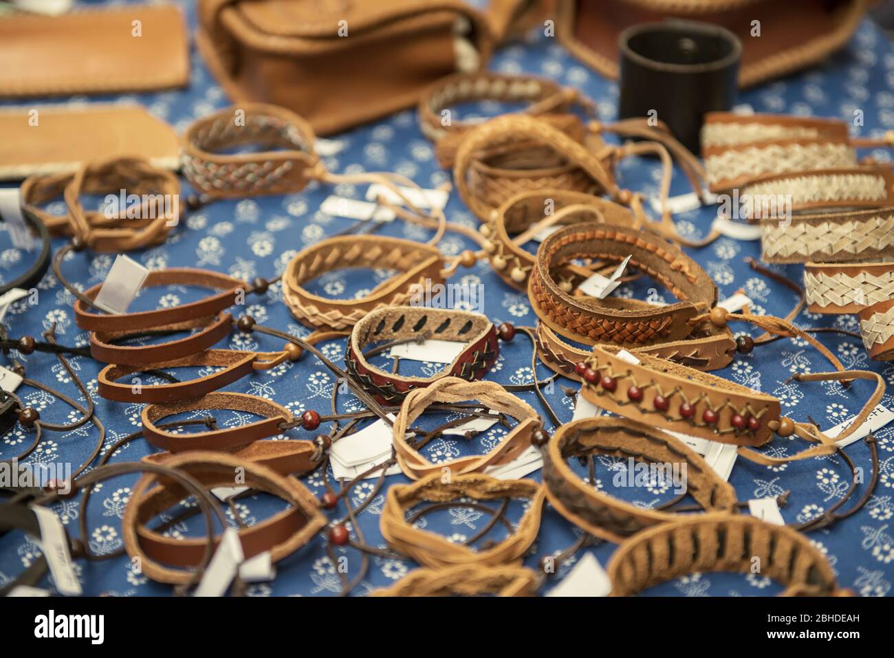Leather handmade souvenir bracelets on the market Stock Photo Alamy