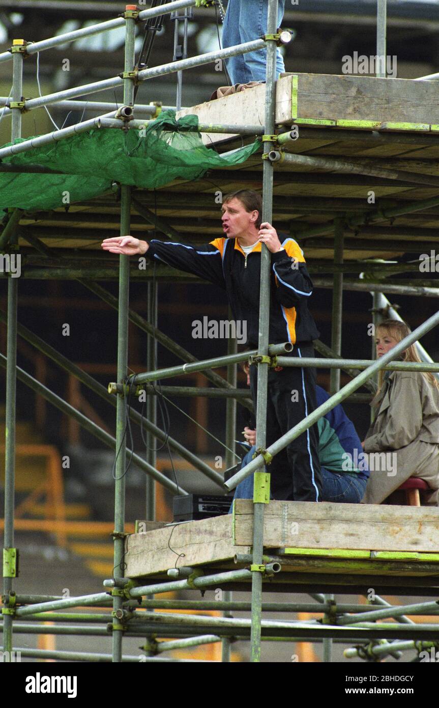 Wolverhampton Wanderers manager Graham Turner shouting instructions from a makeshift stand as his team played Peterborough United 5/9/1993 Stock Photo