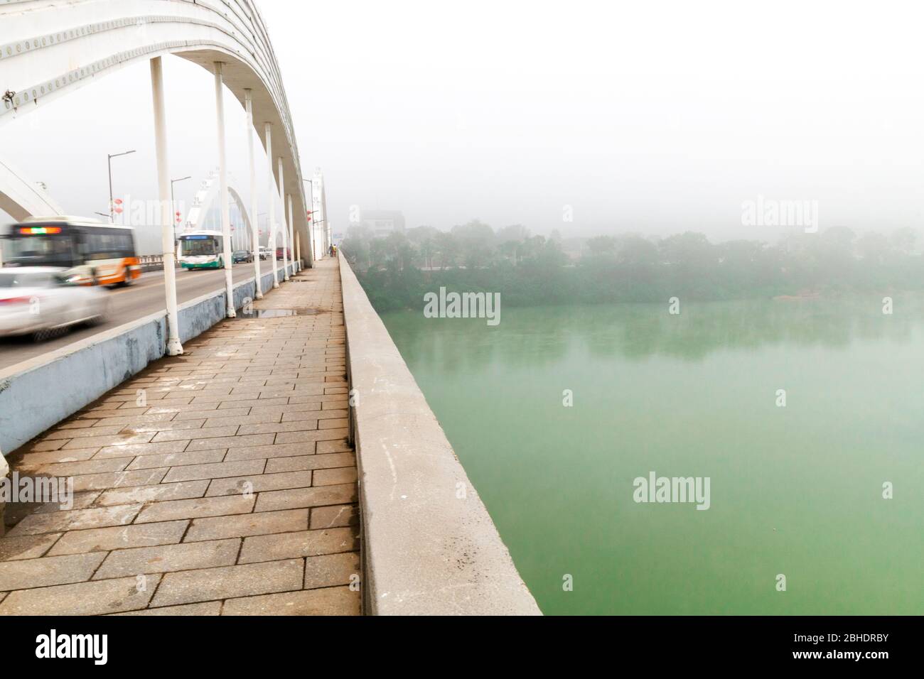 cars speeding on a cable bridge Stock Photo Alamy