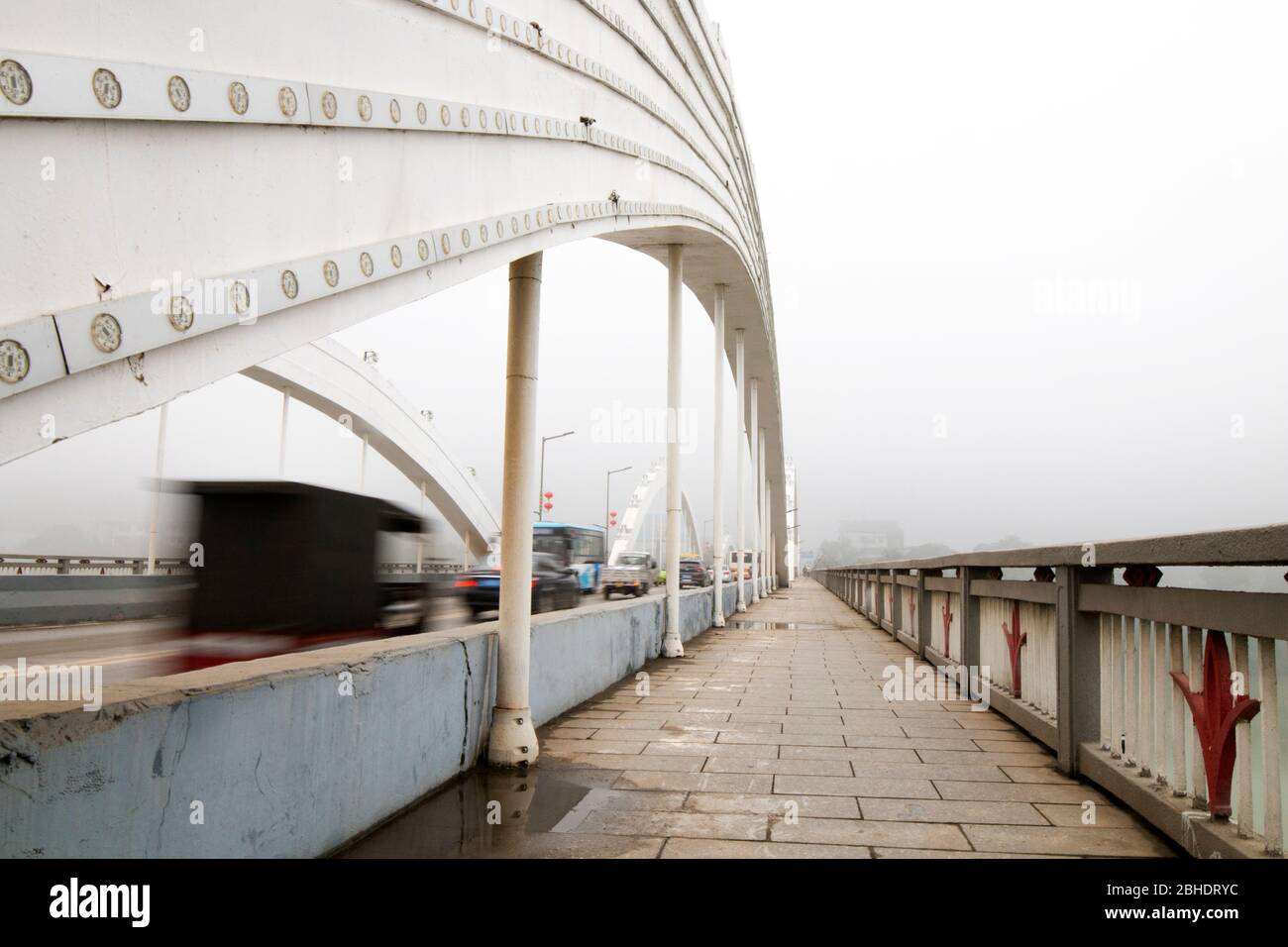 cars speeding on a cable bridge Stock Photo Alamy
