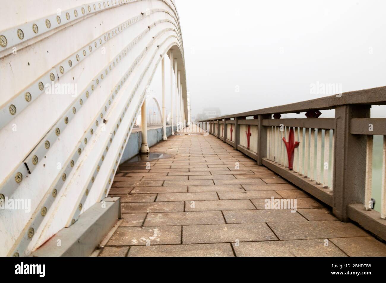 cars speeding on a cable bridge Stock Photo Alamy
