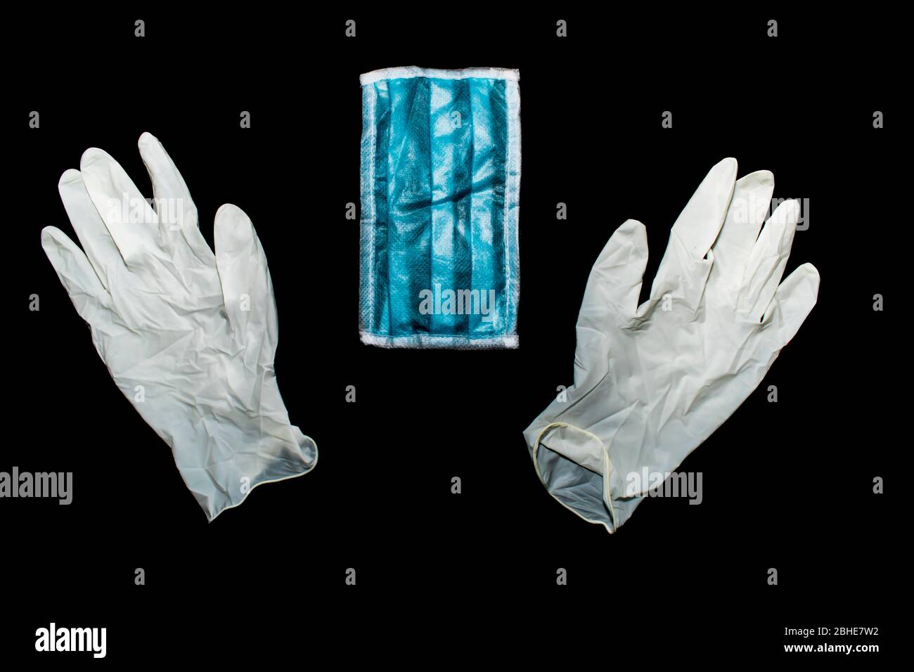 Face mask with latex hand gloves to fight with novel corona prevention and protection concept Stock Photo