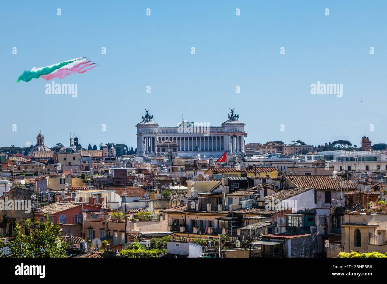 The Frecce Tricolori (tricolor arrows) fly over Rome during the feast of April 25, the anniversary of the liberation of Italy (Liberation Day) to commemorate the end of the Nazi occupation during the Second World War and the victory of the Resistance in Italy. This is distinct from the Republic Day, which takes place on June 2nd. Stock Photo