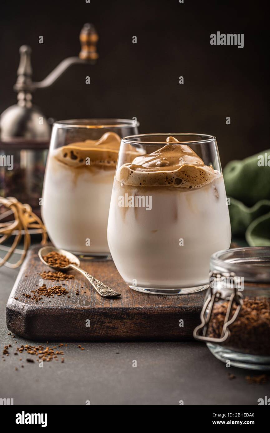 Dalgona coffee in glass cup Stock Photo