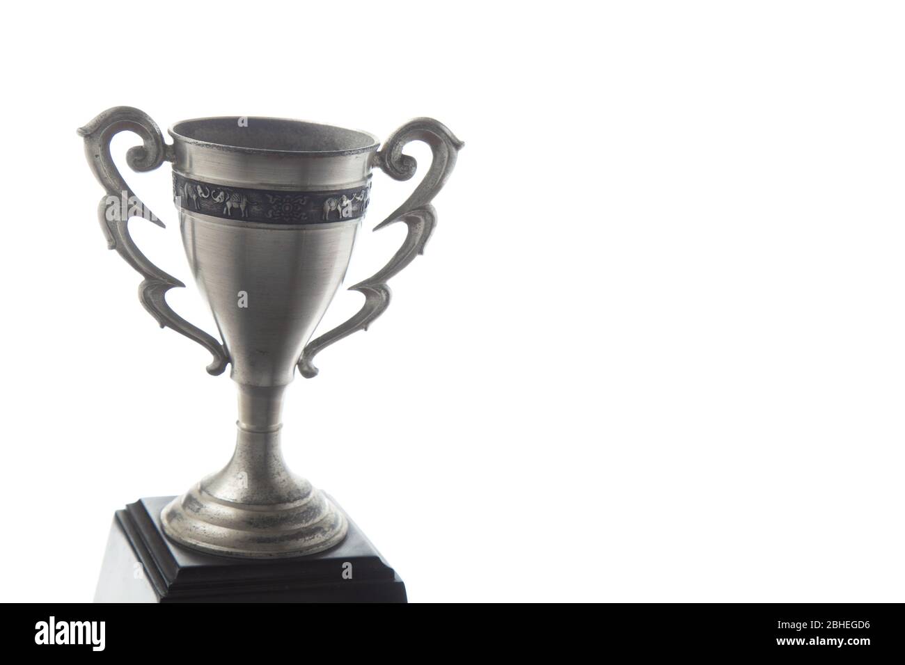 Silver trophy isolated on white background. Winning awards Stock Photo