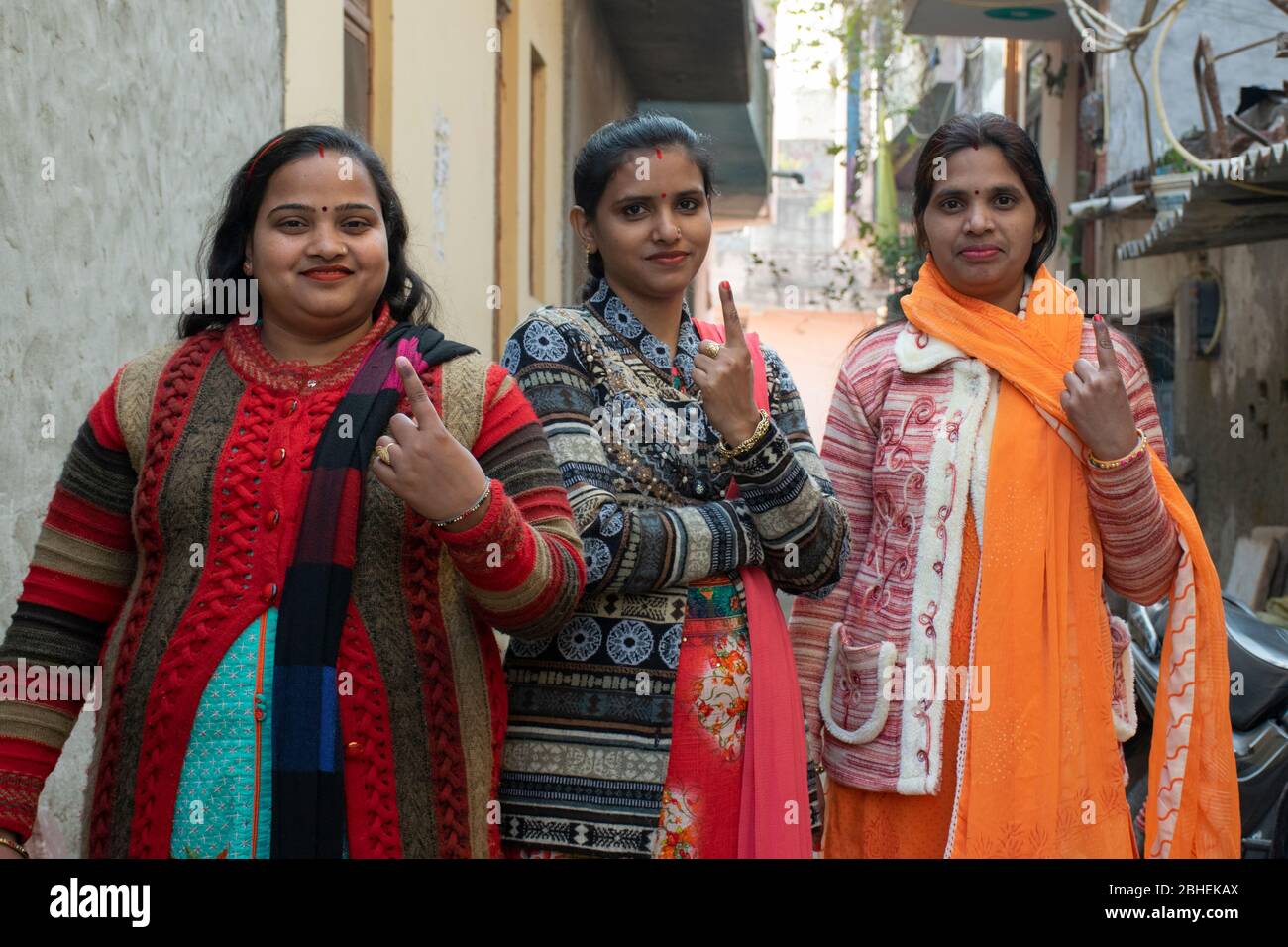 indian woman voters showing voter mark on finger after polling Stock Photo