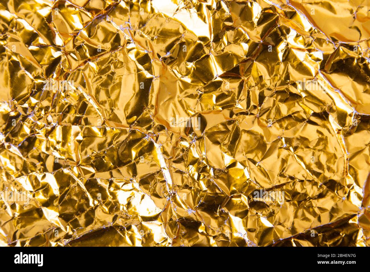 Gold yellow crumpled paper hi-res stock photography and images - Alamy