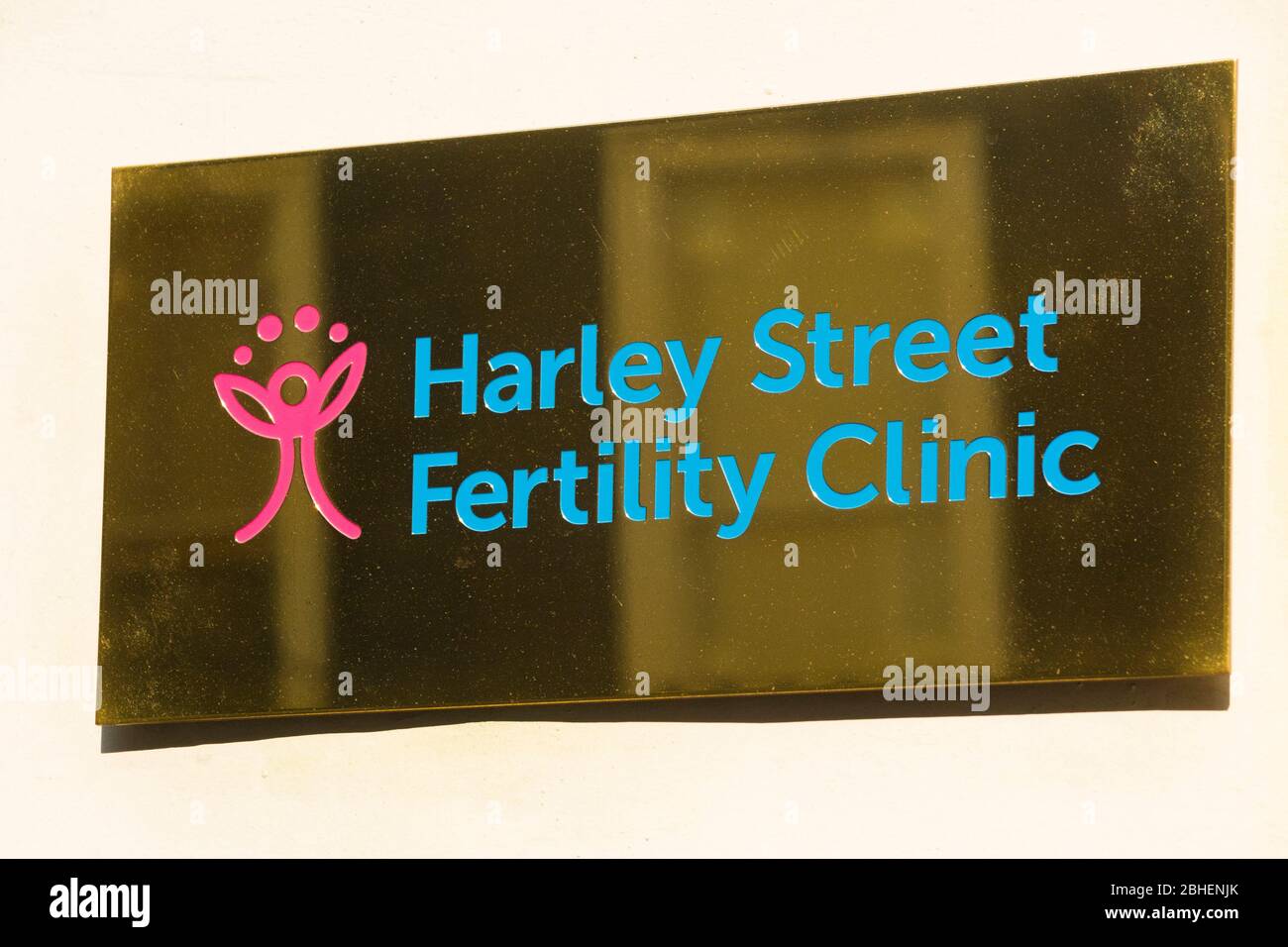 Brass sign for Fertility Clinic – The Harley Street Fertility Clinic – outside medical consulting offices / rooms in Harley Street, London. UK. (118) Stock Photo