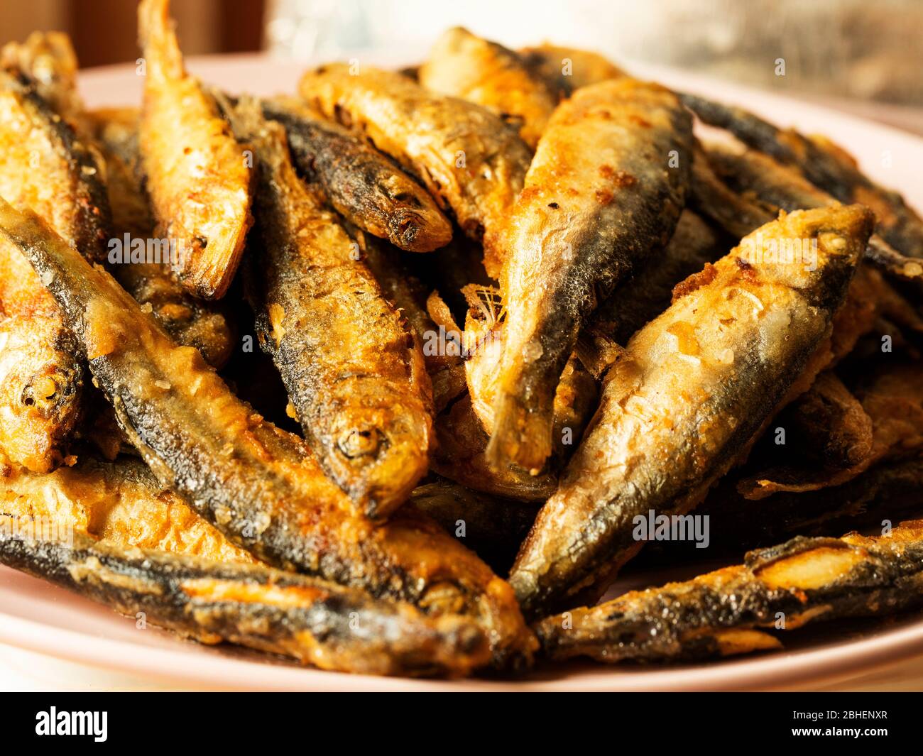 Fried herring on a plate Stock Photo - Alamy
