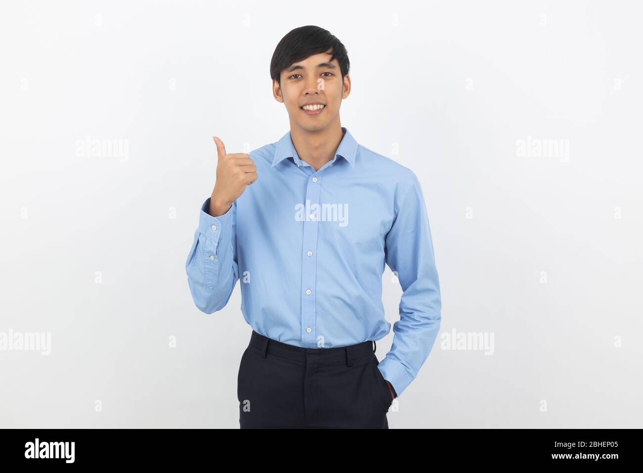 Young handsome asian business man smiling and showing thumbs up ...