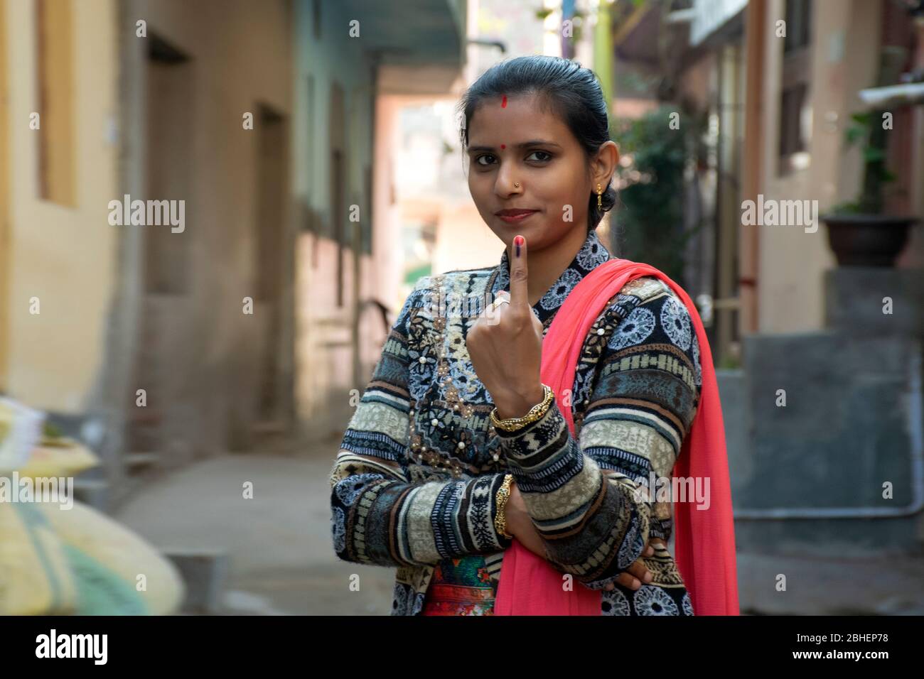 indian woman showing voting mark in hand after polling the Vote Stock Photo