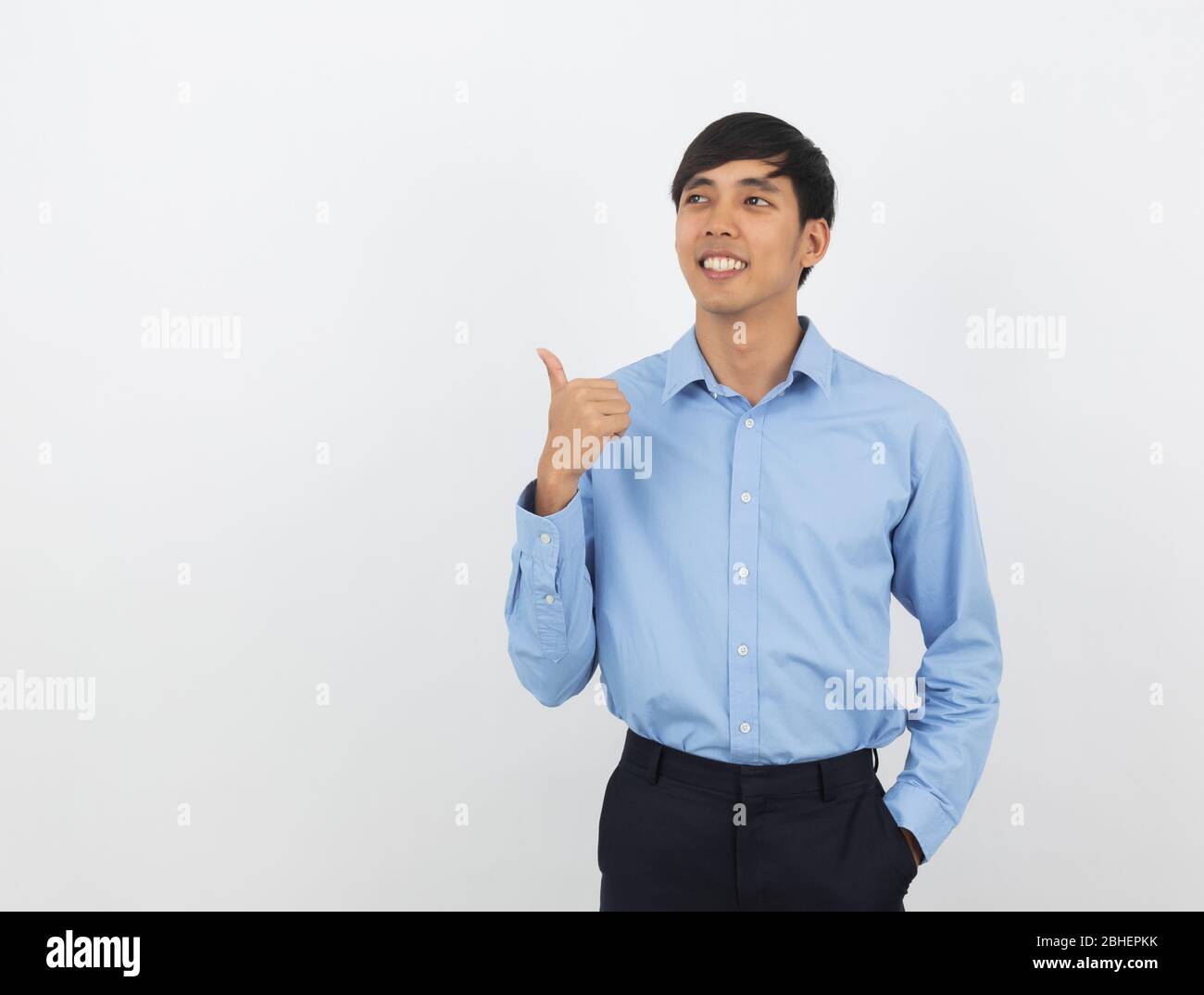 Young handsome asian business man smiling and showing thumbs up ...
