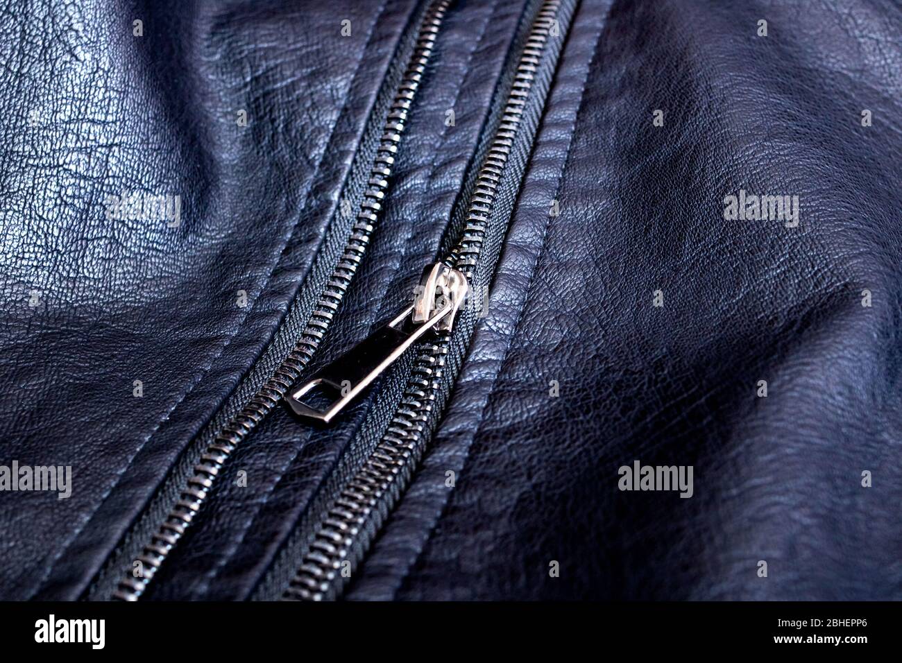 Zipper and rivets on black leather clothes Stock Photo Alamy