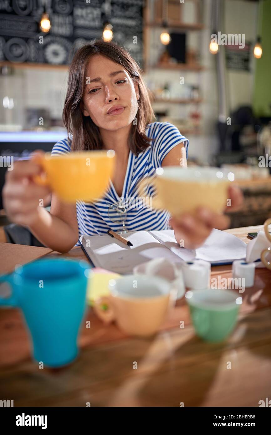 Woman thinking holding pencil hi-res stock photography and images - Alamy