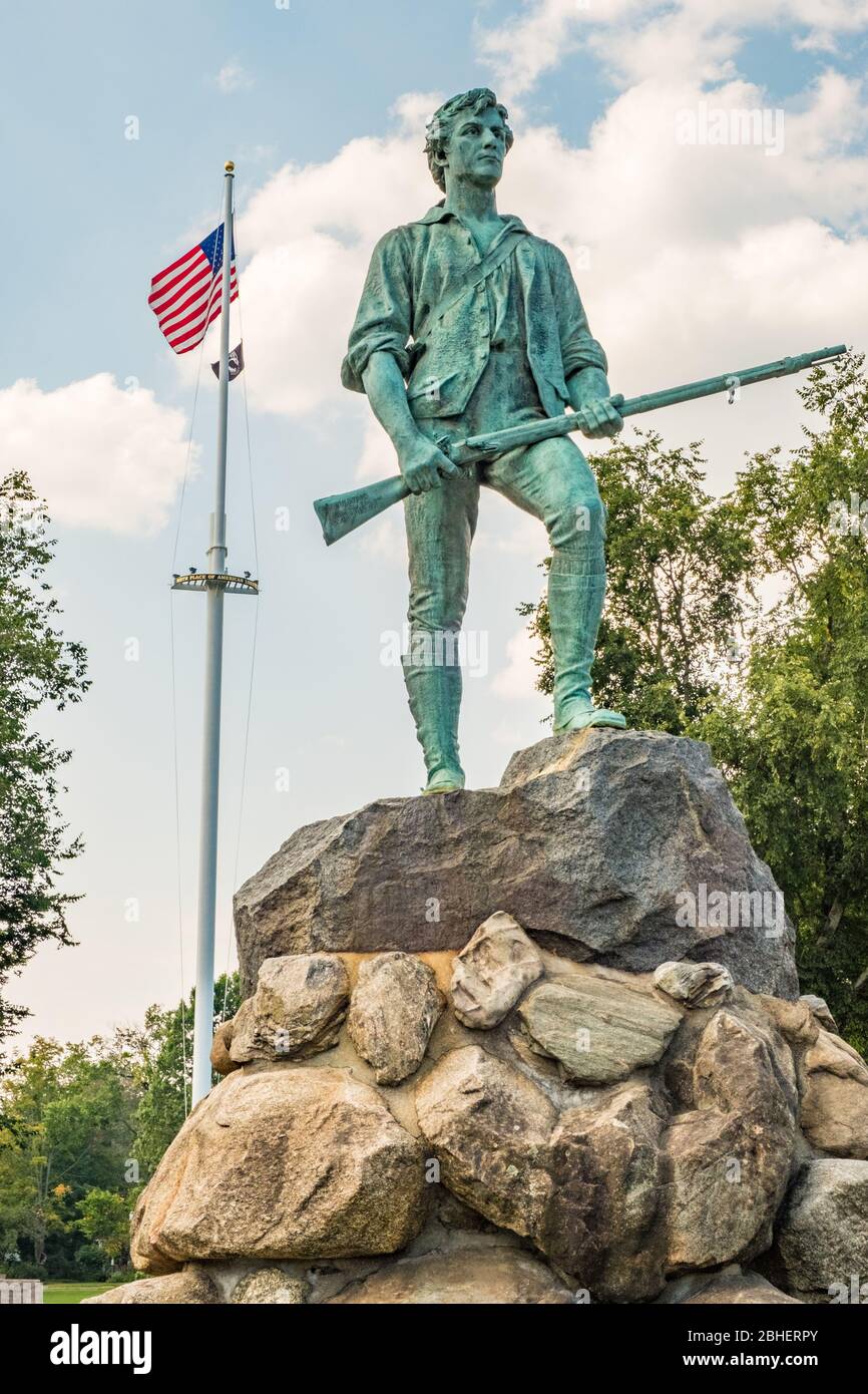 Minuteman statue on the town common in Lexington, MA Stock Photo