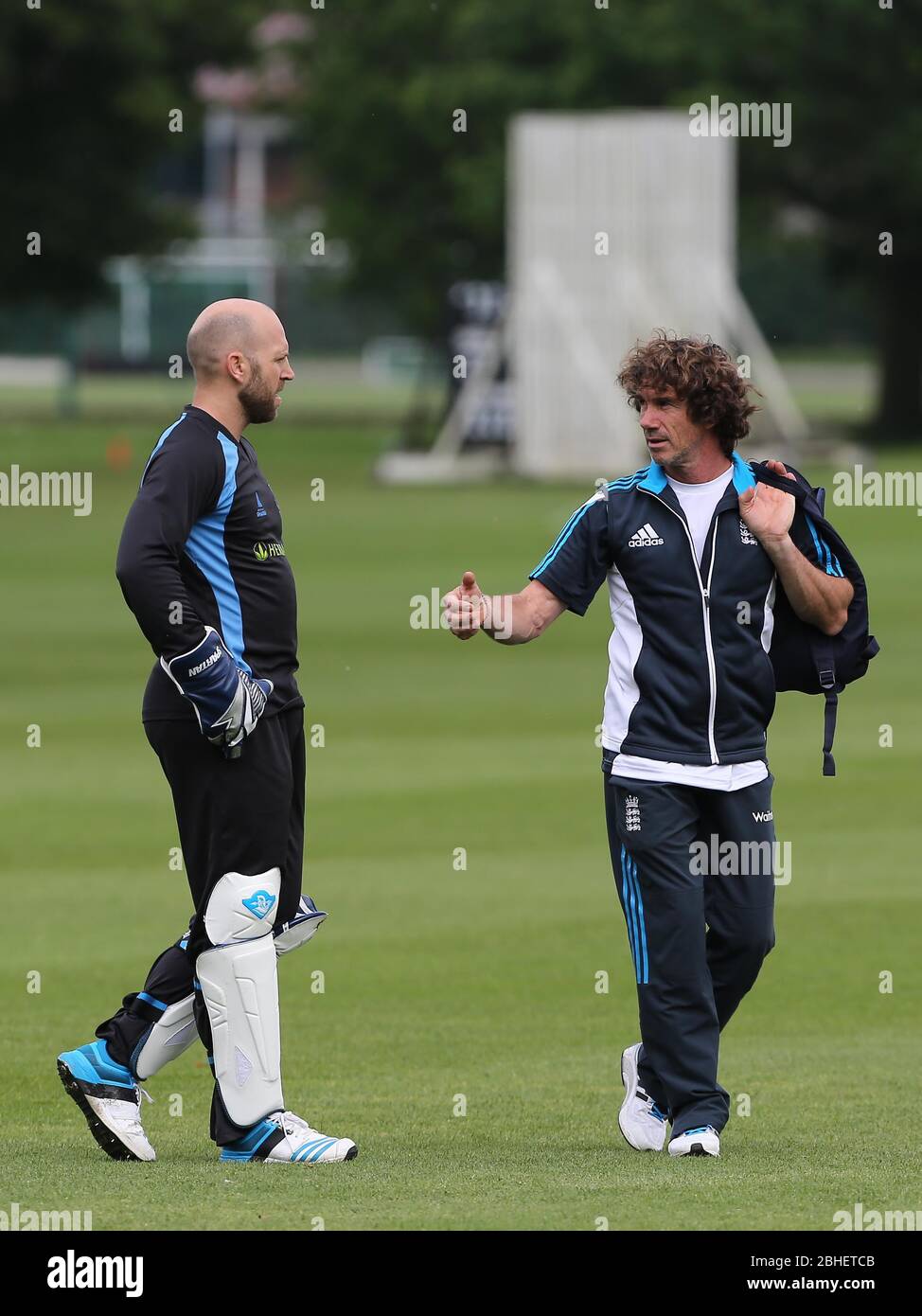 Matt Prior trains with England's wicket keeping coach Bruce French coach at The Merchant Taylors' School in Northwood, Middlesex. May 29, 2014. James Boardman/ TELEPHOTO IMAGES Stock Photo