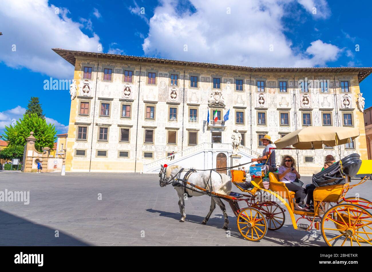 Pisa, Italy, September 14, 2018: Tourists in carriage chariot on Piazza ...