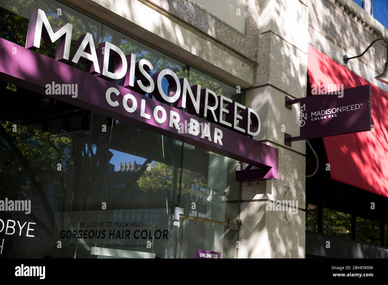 A logo sign outside of a Madison Reed Color Bar store location in Bethesda, Maryland on April 22, 2020. Stock Photo