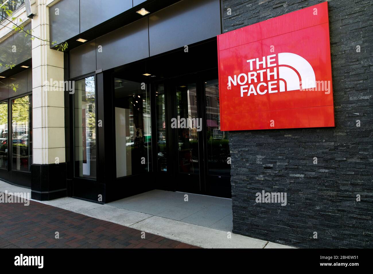 A logo sign outside of a The North Face retail store location in Bethesda,  Maryland on April 22, 2020 Stock Photo - Alamy