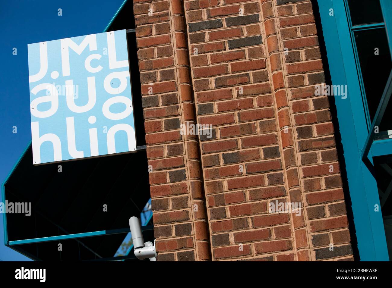 A logo sign outside of a J.McLaughlin retail store location in Bethesda, Maryland on April 22, 2020. Stock Photo