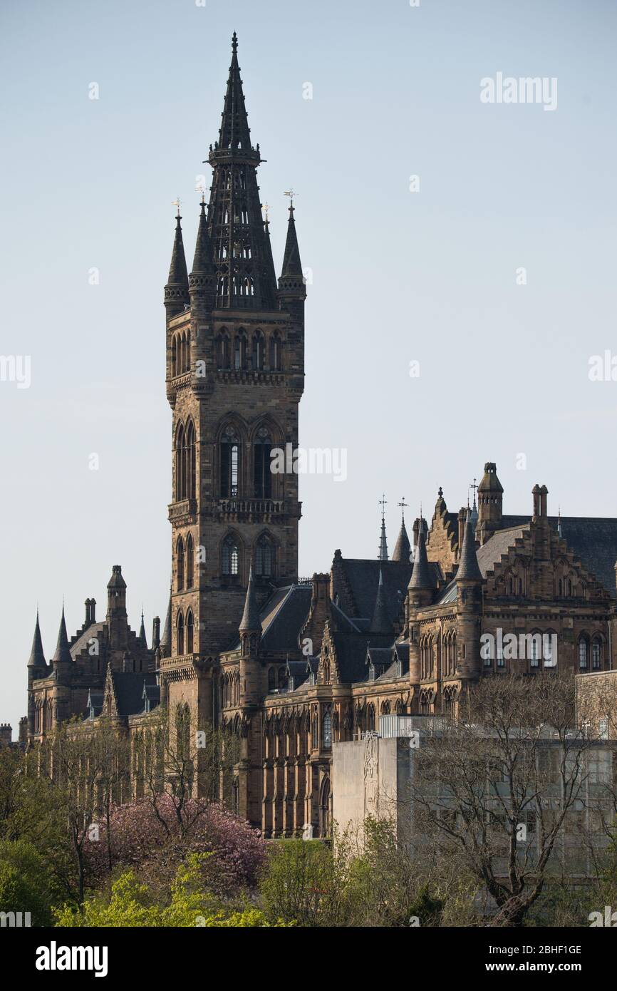 Glasgow, UK. 25th Apr, 2020. Pictured: Glasgow University tower. Scenes from the first weekend of the extended lockdown from KelvinGrove Park in Glasgow's West End during a very hot and sunny Saturday. Credit: Colin Fisher/Alamy Live News Stock Photo