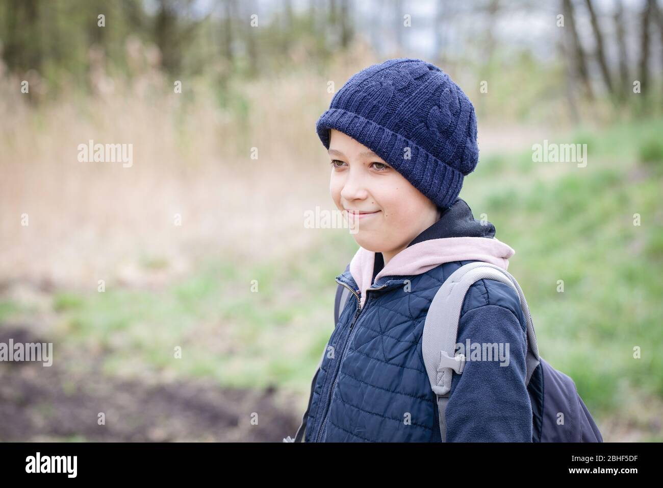 Boy portrait outdoors, Spring walk in woods. Stock Photo