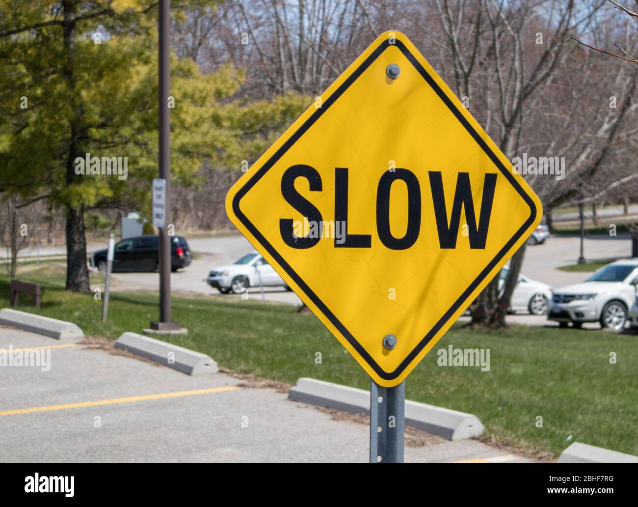 SLOW traffic signage at the parking lots Stock Photo Alamy