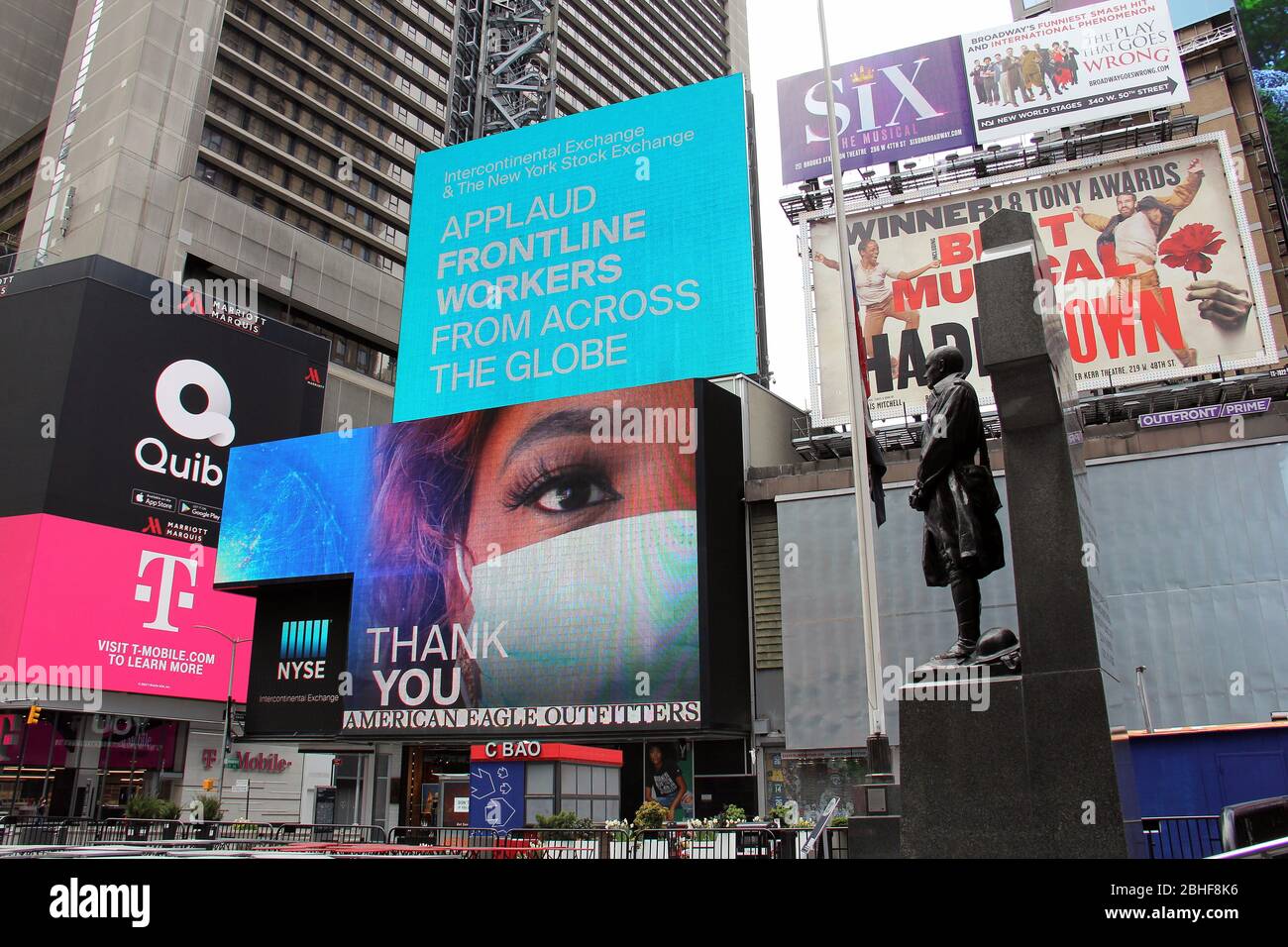 Times Square billboards promoting social distancing and expressing support to first-responders and healthcare workers in time of COVID-19, NYC Stock Photo