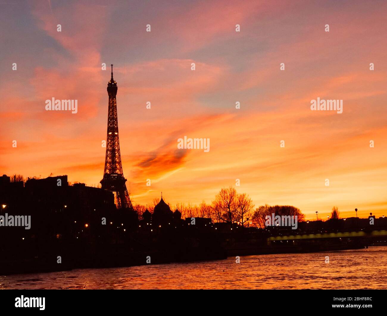 Eiffel Tower over the sunset in Paris, France Stock Photo