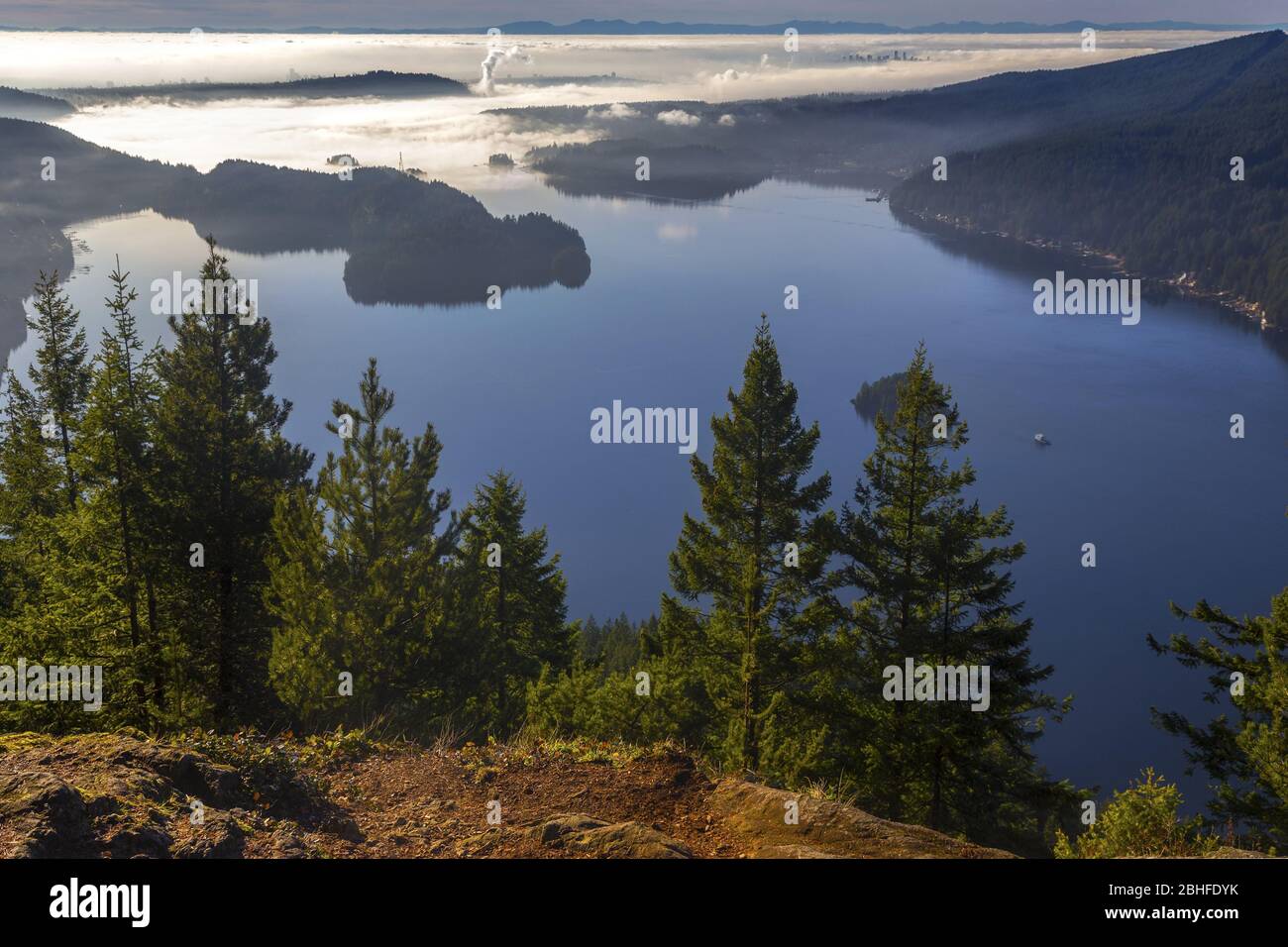 Scenic Aerial Landscape View Indian Arm Low Clouds Horizon Vancouver City Skyline. Diez Vistas Hiking North Shore Mountains British Columbia Canada Stock Photo